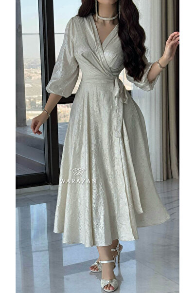 Warazan A soft wrap dress with a waist tie for special occasions.