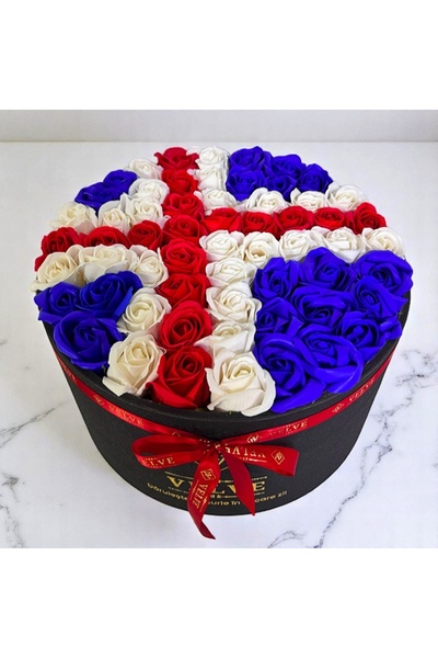 velve Country floral arrangement, in a round box with 55 soap roses, Iceland