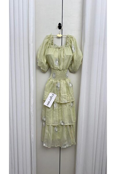 ABRARYZ Riviera's white and apple-colored dress