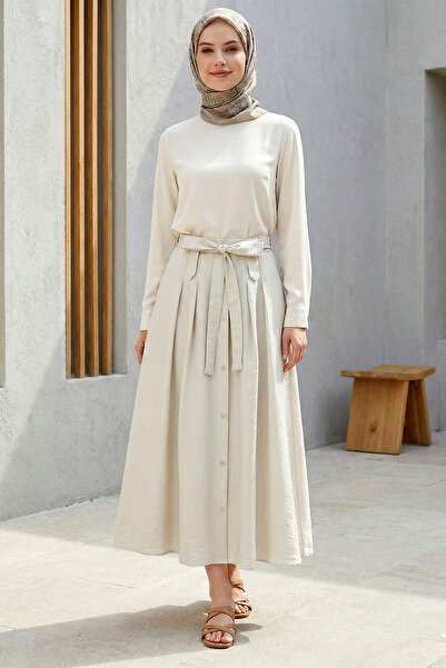 Kirazgym Fusta de damă din țesătură tip parașută, cu nasturi în față și șiret...