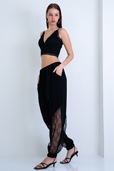 Trend Alaçatı Stili Women's black wide leg trousers with lace detail and belt...