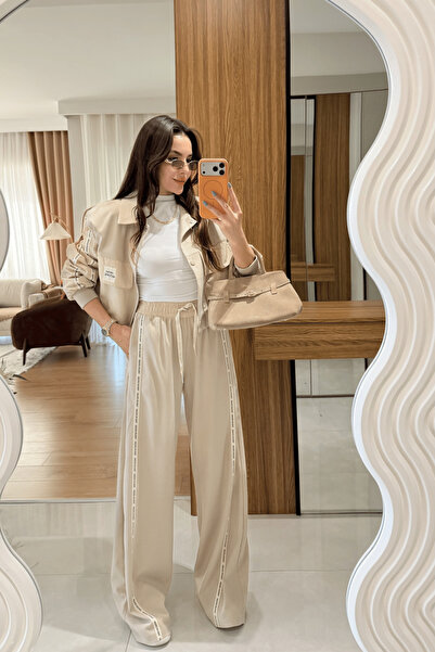 Gizem Ecemiş Holden Bej Kenarları Yazılı Pantolon