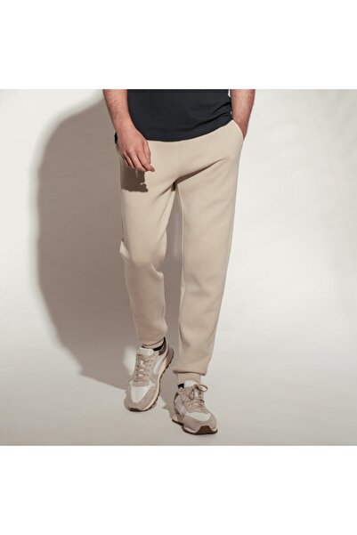 Giordano بنطال رياضي رجالي من قماش تيري فرنسي متوسط ​​الارتفاع بقصة ضيقة