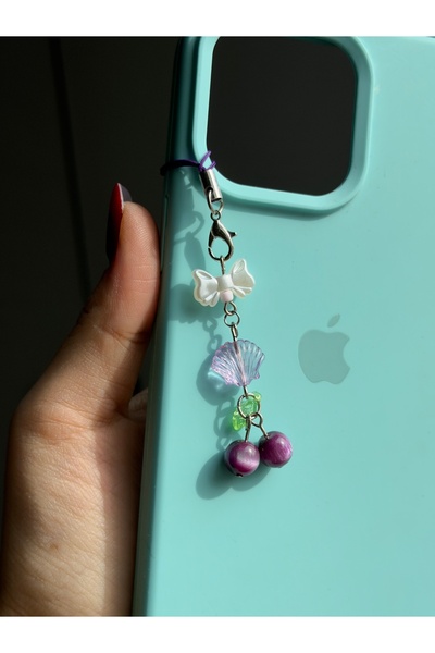 WhimsyWhite Mor Kiraz Figürlü Telefon Charmı – Fiyonk ve Deniz Kabuğu Detaylı...