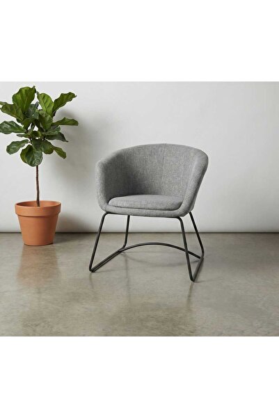 Arnohome A stylish side chair with a round, padded back and soft-touch fabric...