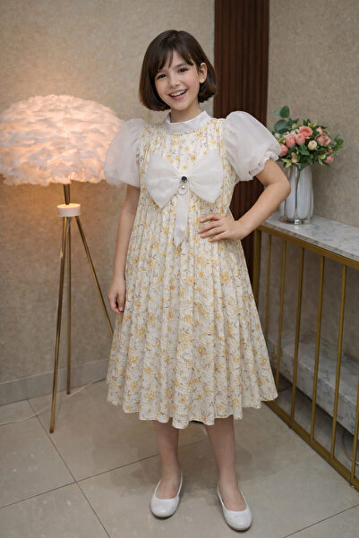 DVNA Tulip Spring Dress – Floral design with elegant pleats, puff sleeves, an...