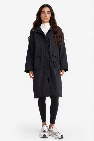 DeFacto Langer Regenmantel mit Kapuze und Reißverschluss in normaler Passform...