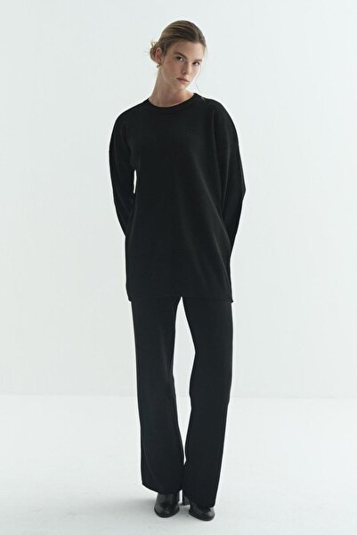 Merve Gültekin طقم تريكو ريبانا جيسيتي باللون الأسود