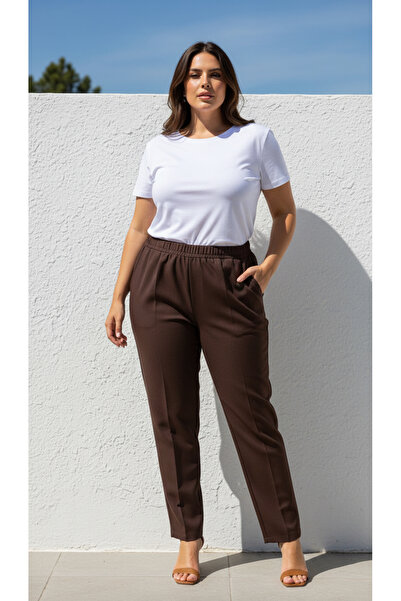 Curly Коричневі ткані штани з морквою