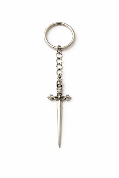 HER ŞEY NOTA www.herseynota.com Breloc cu figurină metalică în formă subțire