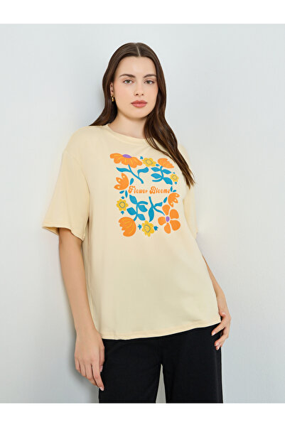 Styli Women Beige Floral Graphic Oversized T-Shirt