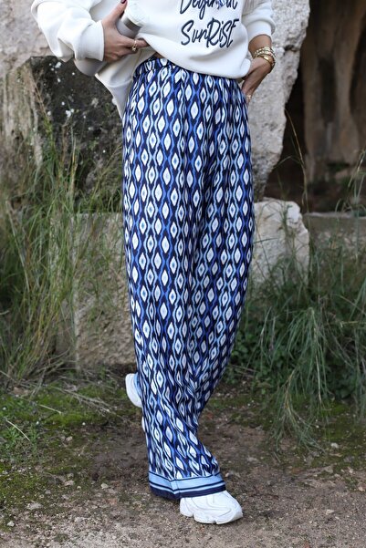 bytugcekaya Navy blue geometric pattern trousers