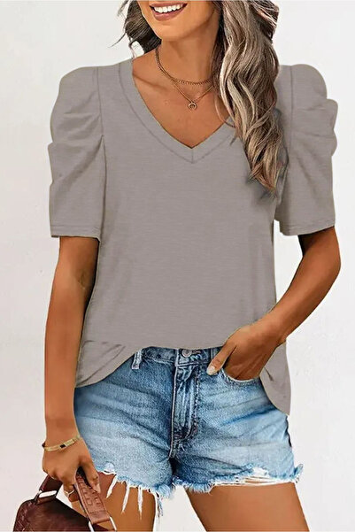 GENERAL A gray t-shirt with pleated sleeves and a distinctive, modern V-neck.