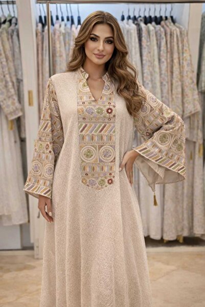 COUNTRY FASHION Elegant women's jalabiya, available for a limited time.