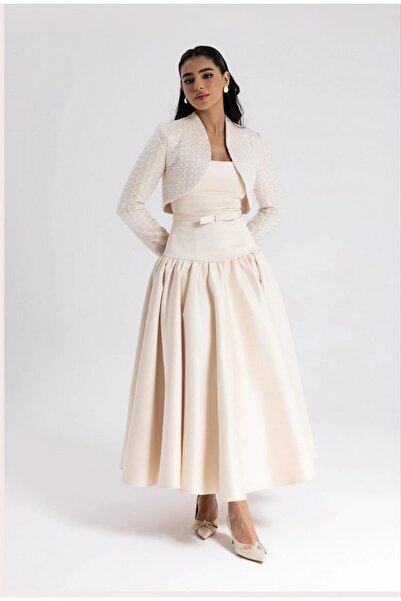 Ta Prince An elegant Eid dress with a soft, feminine design that combines lux...