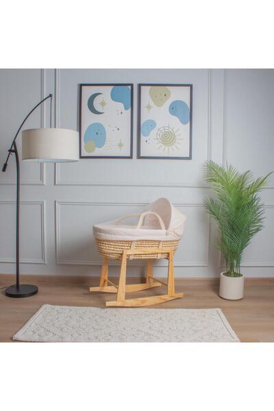 My Baby A straw Moses basket bed with a beige striped fabric cover and a wood...