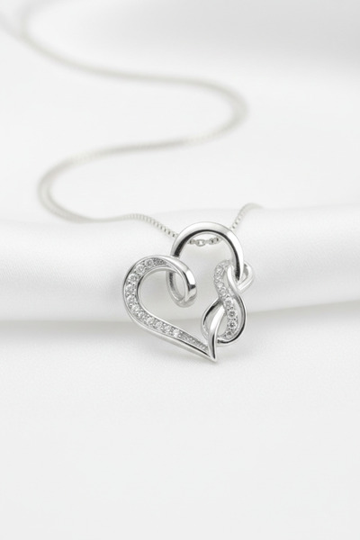 özgül takı ve tasarım قلادة نسائية من الفولاذ المقاوم للصدأ باللون الفضي مع أ...