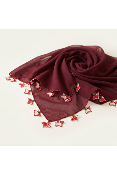 FunoonAlhiyakah A veil made of voile fabric with hand-crocheted edges.