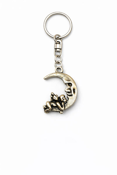 HER ŞEY NOTA www.herseynota.com Breloc metalic cu figurină în formă de lună –...