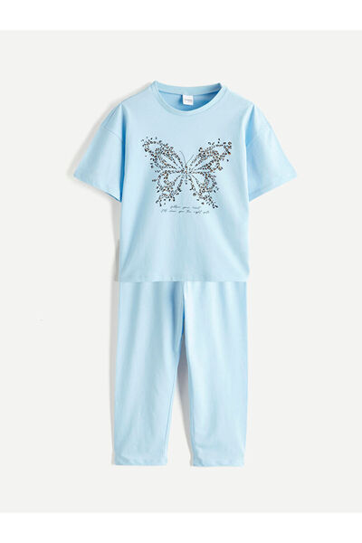 LC Waikiki طقم بيجامة بناتي مطبوع عليه فراشات من UZG STORE لمحبي الأناقة