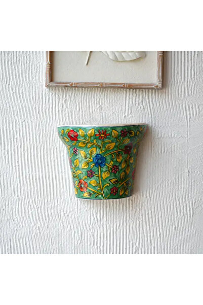 Generic Ceramic Wall Plant Holder with Green Decorations and Colorful Flowers