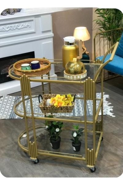 DEC39 Luxurious gold serving trolley with an elegant design