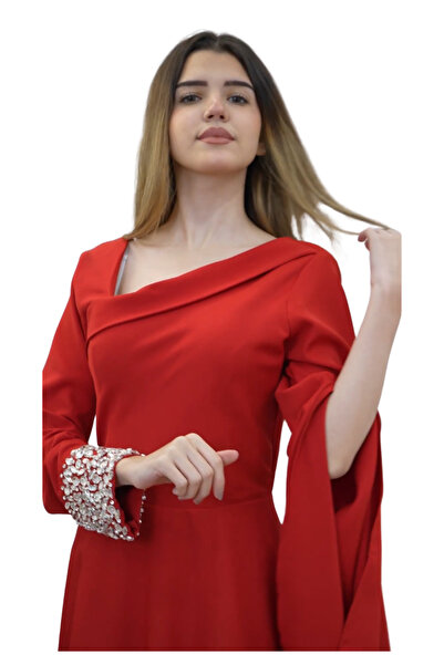MARIETTAKSA A soft red dress with embellishments on the sleeves