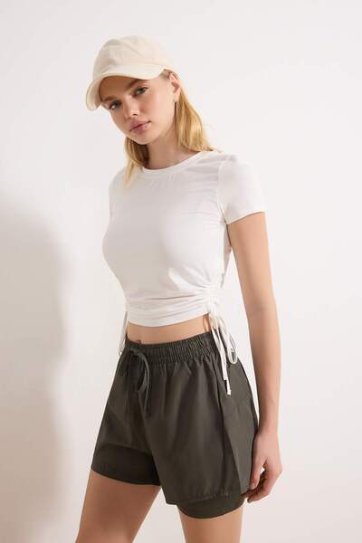 Trendyol Collection Εκρού Πλεκτό Αθλητικό Μπλουζάκι από Μικρούχο Ύφασμα με Λε...