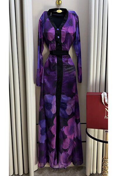 Generic Elaf's dress is elegant in shades of purple.