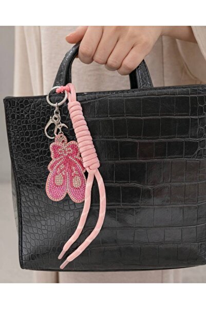 MD Moda Accessories حقيبة برباط على شكل حذاء راقصة الباليه مزينة بالأحجار وسل...