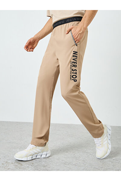 Styli Men Beige Graphic Training Track Pants