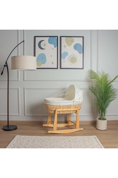 My Baby A straw Moses basket bed with a cream-colored cotton fabric cover and...