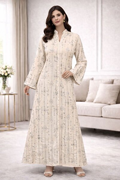 ELLA A Gulf-style jalabiya with a feminine design and luxurious embroidery th...