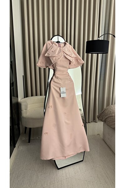Nareen Fashion An elegant dress in a soft powder pink hue, with a sophisticat...