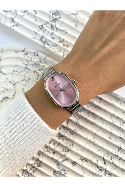 Mazzy ساعة يد نسائية من ريجا بعلبة بيضاوية فضية اللون وداخلها لون وردي