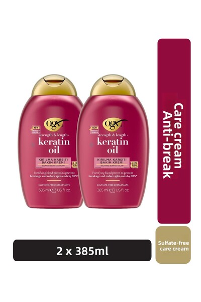 OGX كريم العناية بالشعر الخالي من الكبريتات بزيت الكيراتين المضاد للتكسر 385 مل