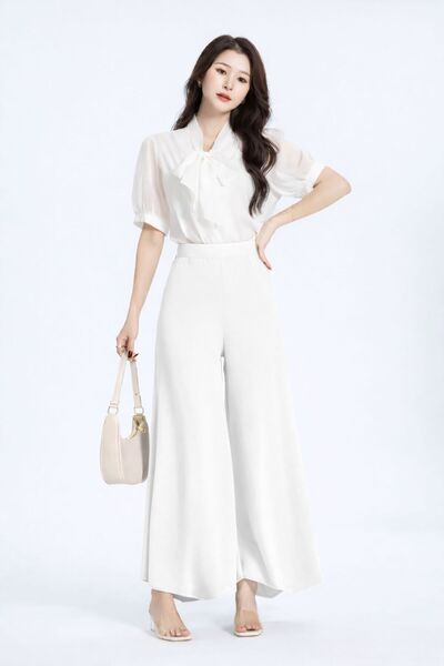 LaFont Women's trousers in a soft, flowing fabric with an elasticated back wa...