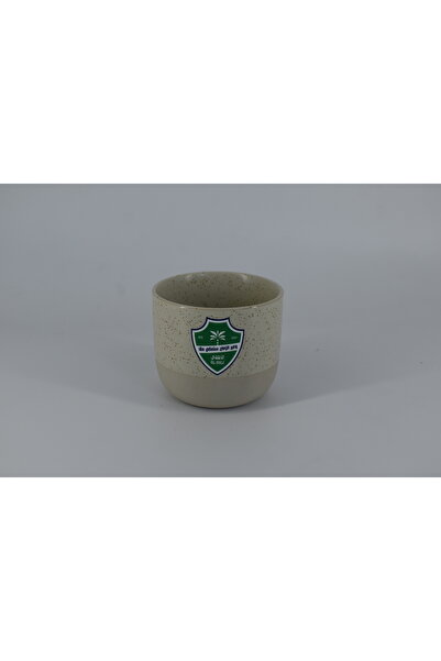 SP A stylish ceramic mug with a modern design and a beige polka dot color, fe...