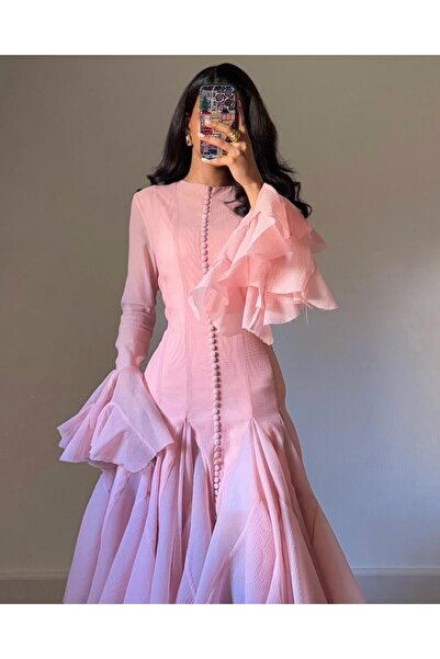 saher-alshrek A nude midi dress with a unique cut