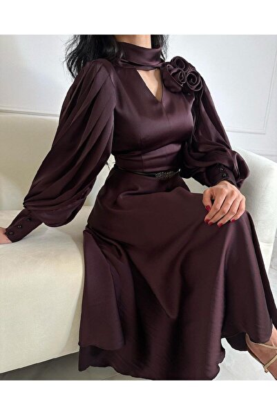 NASMA فستان بتصميم يلفت الانظار