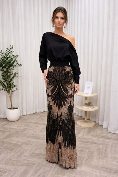 Farah Fashion An evening dress that embodies luxury and overwhelming feminini...