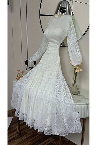 Viola2026 An elegant white lace dress with a sophisticated design that beauti...
