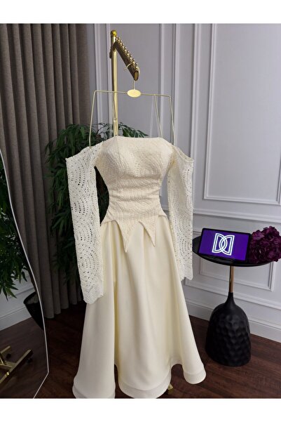 ainaqat aljawhara evening dress