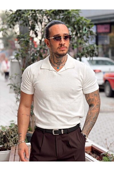 manch collection تي شيرت تريكو بياقة بولو أساسي باللون الأبيض