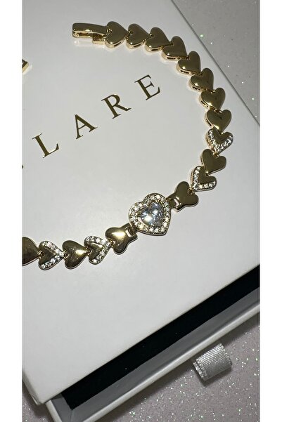 GLARE JEWELRY CO سوار من الفولاذ الذهبي مرصع بحجر الزركون على شكل قلب