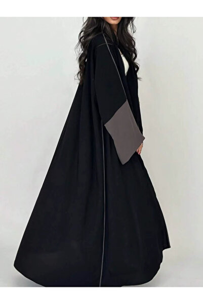 Abay-ti An elegant abaya with sophisticated details, featuring beige embellis...