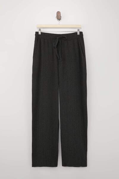 Trendyol Collection Black Straight Cut Textured Open Leg Sweatpants Tmnss25Ea...