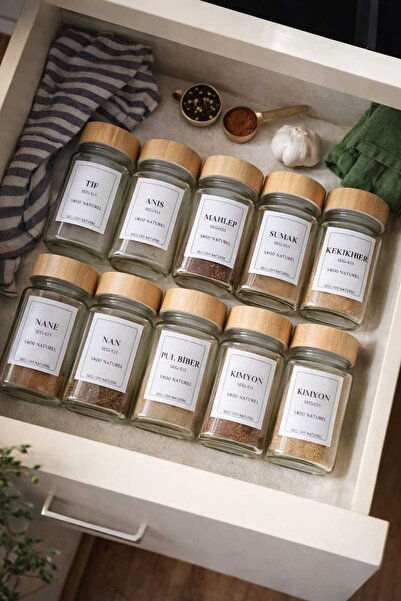 Durina Living طقم 12 وعاء توابل زجاجي مربع الشكل بغطاء من الخيزران وفوهة داخل...