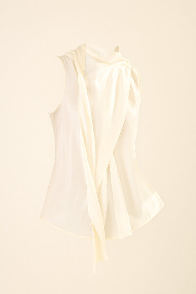 Setre Πλεκτό εκρού αμάνικο ασύμμετρο με λεπτομέρεια σάλι με ζιβάγκο