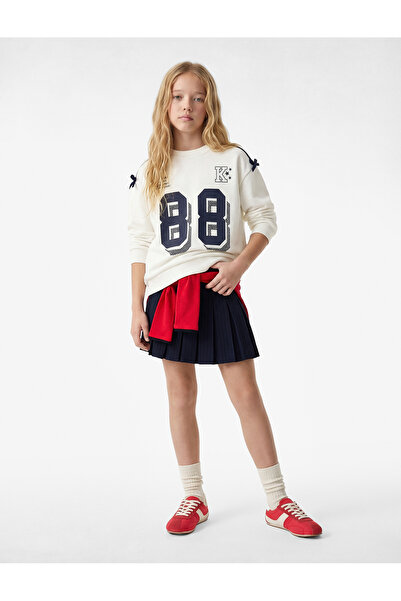 Koton Дългоръкавна блуза с велосипедна яка и принт с панделка